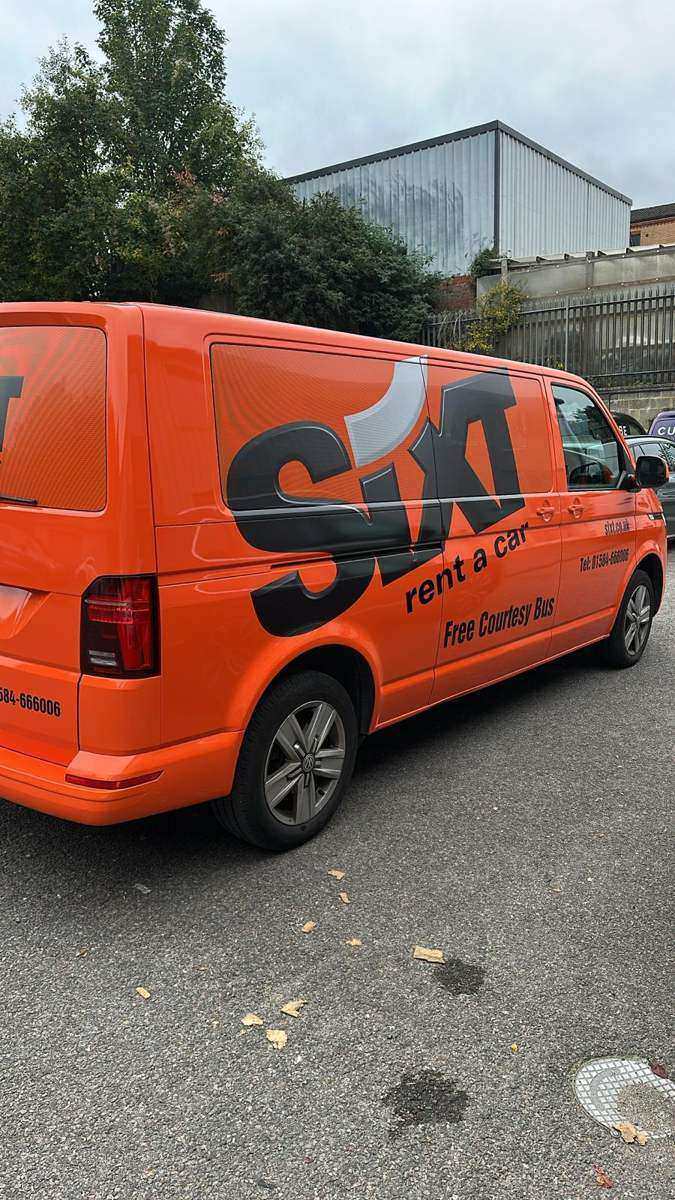 Orange SKI van wrap inside the unit